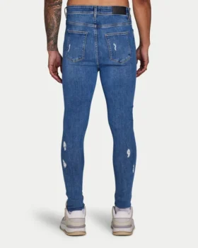 Men’s spray-on ripped jean – mid blue